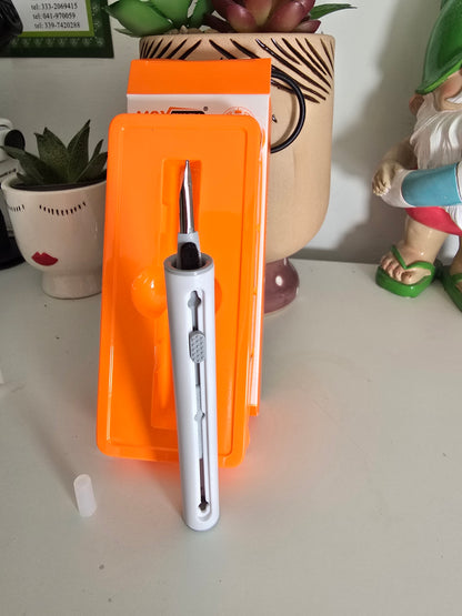 Portable pen for cleaning earphones and keyboards, compatible with headphones, smartphones, tablets, and laptops, compact tool for residue removal and earphone maintenance